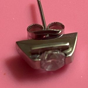 Approximately 5 grams of 316L CZ earrings.